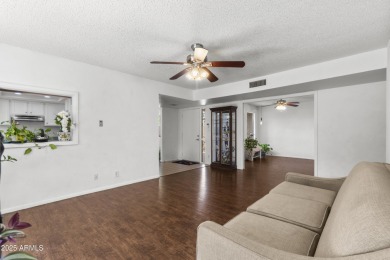 Step inside this 3-bedroom patio home in the sought-after on Leisure World Country Club in Arizona - for sale on GolfHomes.com, golf home, golf lot