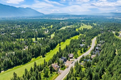 This striking 4-bedroom, 3-bathroom tri-level home combines on Meadow Lake Golf Resort in Montana - for sale on GolfHomes.com, golf home, golf lot