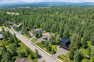 This striking 4-bedroom, 3-bathroom tri-level home combines on Meadow Lake Golf Resort in Montana - for sale on GolfHomes.com, golf home, golf lot
