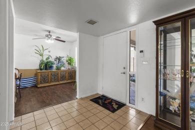Step inside this 3-bedroom patio home in the sought-after on Leisure World Country Club in Arizona - for sale on GolfHomes.com, golf home, golf lot