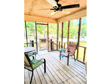 Experience lake life with water views of Lake Royale! This cozy on River Golf and Country Club at Lake Royale in North Carolina - for sale on GolfHomes.com, golf home, golf lot