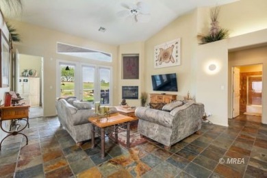 Step into this beautifully furnished Contemporary Southwest on The Oasis Golf Club in Nevada - for sale on GolfHomes.com, golf home, golf lot