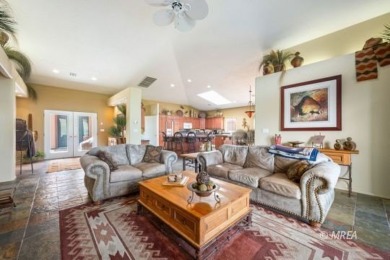 Step into this beautifully furnished Contemporary Southwest on The Oasis Golf Club in Nevada - for sale on GolfHomes.com, golf home, golf lot