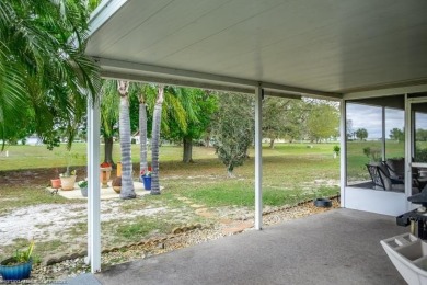 As you pull in the driveway you can see this well taken care of on Spring Lake Golf Resort in Florida - for sale on GolfHomes.com, golf home, golf lot