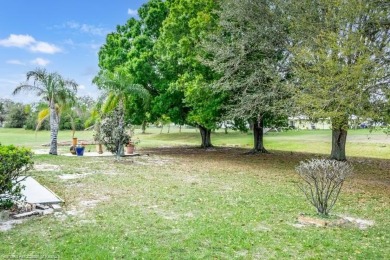 As you pull in the driveway you can see this well taken care of on Spring Lake Golf Resort in Florida - for sale on GolfHomes.com, golf home, golf lot