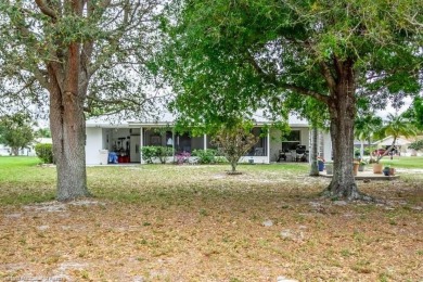 As you pull in the driveway you can see this well taken care of on Spring Lake Golf Resort in Florida - for sale on GolfHomes.com, golf home, golf lot