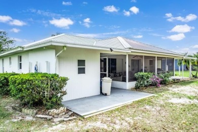 As you pull in the driveway you can see this well taken care of on Spring Lake Golf Resort in Florida - for sale on GolfHomes.com, golf home, golf lot