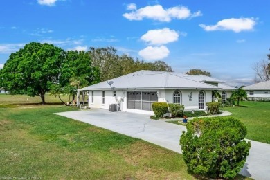 As you pull in the driveway you can see this well taken care of on Spring Lake Golf Resort in Florida - for sale on GolfHomes.com, golf home, golf lot