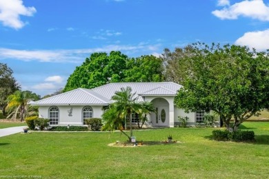 As you pull in the driveway you can see this well taken care of on Spring Lake Golf Resort in Florida - for sale on GolfHomes.com, golf home, golf lot