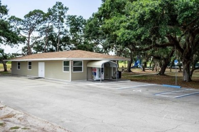 As you pull in the driveway you can see this well taken care of on Spring Lake Golf Resort in Florida - for sale on GolfHomes.com, golf home, golf lot