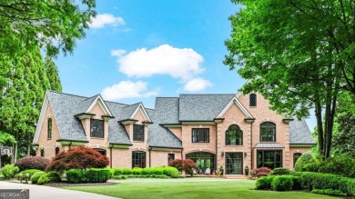 Tucked into a quiet cul-de-sac within one of Suwanee's most on Laurel Springs Golf Club in Georgia - for sale on GolfHomes.com, golf home, golf lot