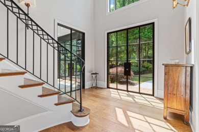 Tucked into a quiet cul-de-sac within one of Suwanee's most on Laurel Springs Golf Club in Georgia - for sale on GolfHomes.com, golf home, golf lot