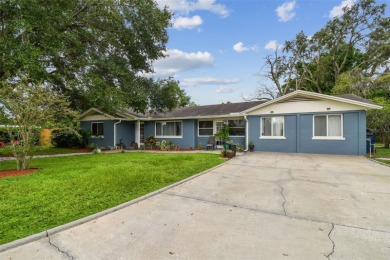 This stunning ranch-style home in beautiful Forest Hills offers on Babe Zaharias Golf Course in Florida - for sale on GolfHomes.com, golf home, golf lot