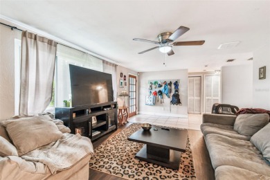 This stunning ranch-style home in beautiful Forest Hills offers on Babe Zaharias Golf Course in Florida - for sale on GolfHomes.com, golf home, golf lot