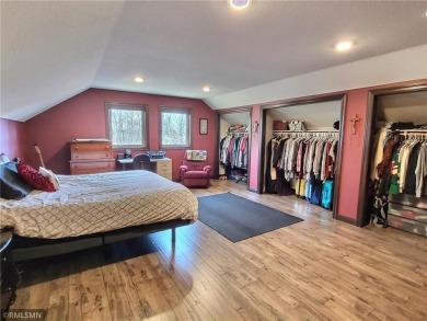 Tucked away in the woods on a spacious 1.8-acre lot, this modern on Whispering Pines Golf Club in Minnesota - for sale on GolfHomes.com, golf home, golf lot