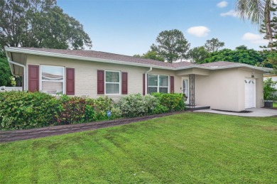 Beautifully Renovated Clearwater home that is just minutes to on Clearwater Country Club in Florida - for sale on GolfHomes.com, golf home, golf lot