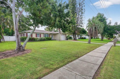 Beautifully Renovated Clearwater home that is just minutes to on Clearwater Country Club in Florida - for sale on GolfHomes.com, golf home, golf lot