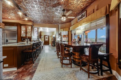 Sheathed in an exquisite brick exterior, this luxurious custom on Lakeview Golf Resort and Spa - Lakeview in West Virginia - for sale on GolfHomes.com, golf home, golf lot