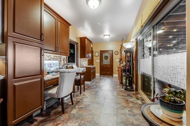 Sheathed in an exquisite brick exterior, this luxurious custom on Lakeview Golf Resort and Spa - Lakeview in West Virginia - for sale on GolfHomes.com, golf home, golf lot