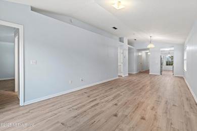 Welcome to this elegantly renovated 2-bedroom, 2-bath home on Julington Creek Golf Club in Florida - for sale on GolfHomes.com, golf home, golf lot