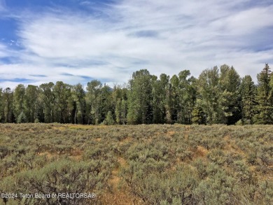 This beautiful 3.45 acre building site in the Owl Creek on Jackson Hole Golf and Tennis Club in Wyoming - for sale on GolfHomes.com, golf home, golf lot