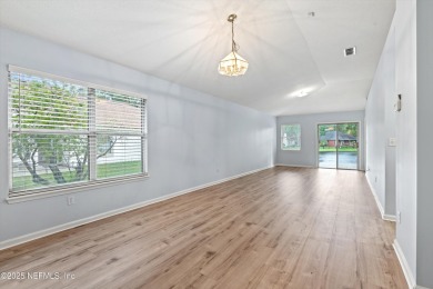 Welcome to this elegantly renovated 2-bedroom, 2-bath home on Julington Creek Golf Club in Florida - for sale on GolfHomes.com, golf home, golf lot