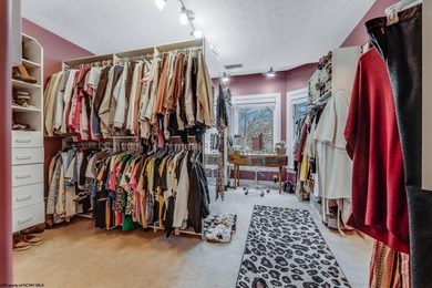 Sheathed in an exquisite brick exterior, this luxurious custom on Lakeview Golf Resort and Spa - Lakeview in West Virginia - for sale on GolfHomes.com, golf home, golf lot