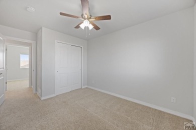 Welcome to 37 W Bonanza Drive, a stunning two-story home nestled on Desert Hawk At Pueblo West in Colorado - for sale on GolfHomes.com, golf home, golf lot