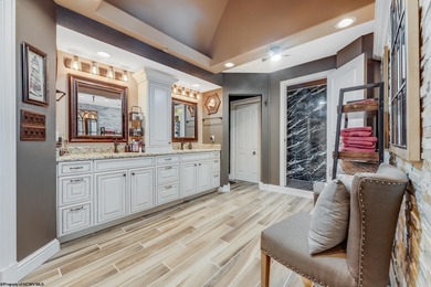 Sheathed in an exquisite brick exterior, this luxurious custom on Lakeview Golf Resort and Spa - Lakeview in West Virginia - for sale on GolfHomes.com, golf home, golf lot