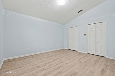 Welcome to this elegantly renovated 2-bedroom, 2-bath home on Julington Creek Golf Club in Florida - for sale on GolfHomes.com, golf home, golf lot