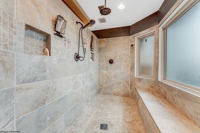 Sheathed in an exquisite brick exterior, this luxurious custom on Lakeview Golf Resort and Spa - Lakeview in West Virginia - for sale on GolfHomes.com, golf home, golf lot