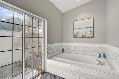 Absolutely beautiful and spacious! This 3-bedroom, 2-bath home on The Meadows Golf and Country Club in Florida - for sale on GolfHomes.com, golf home, golf lot