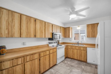 Under contract-accepting backup offers. This beautifully updated on Highland Lakes Executive Golf Course in Florida - for sale on GolfHomes.com, golf home, golf lot