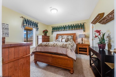 Sheathed in an exquisite brick exterior, this luxurious custom on Lakeview Golf Resort and Spa - Lakeview in West Virginia - for sale on GolfHomes.com, golf home, golf lot