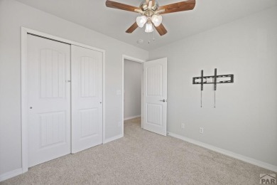 Welcome to 37 W Bonanza Drive, a stunning two-story home nestled on Desert Hawk At Pueblo West in Colorado - for sale on GolfHomes.com, golf home, golf lot