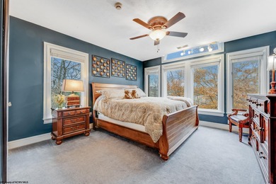 Sheathed in an exquisite brick exterior, this luxurious custom on Lakeview Golf Resort and Spa - Lakeview in West Virginia - for sale on GolfHomes.com, golf home, golf lot