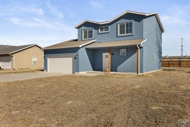 Welcome to 37 W Bonanza Drive, a stunning two-story home nestled on Desert Hawk At Pueblo West in Colorado - for sale on GolfHomes.com, golf home, golf lot