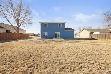 Welcome to 37 W Bonanza Drive, a stunning two-story home nestled on Desert Hawk At Pueblo West in Colorado - for sale on GolfHomes.com, golf home, golf lot