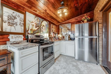 Sheathed in an exquisite brick exterior, this luxurious custom on Lakeview Golf Resort and Spa - Lakeview in West Virginia - for sale on GolfHomes.com, golf home, golf lot