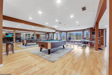 Sheathed in an exquisite brick exterior, this luxurious custom on Lakeview Golf Resort and Spa - Lakeview in West Virginia - for sale on GolfHomes.com, golf home, golf lot