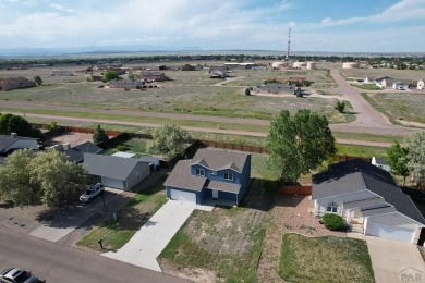 Welcome to 37 W Bonanza Drive, a stunning two-story home nestled on Desert Hawk At Pueblo West in Colorado - for sale on GolfHomes.com, golf home, golf lot