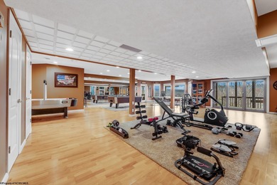 Sheathed in an exquisite brick exterior, this luxurious custom on Lakeview Golf Resort and Spa - Lakeview in West Virginia - for sale on GolfHomes.com, golf home, golf lot