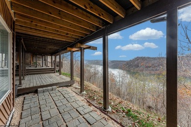 Sheathed in an exquisite brick exterior, this luxurious custom on Lakeview Golf Resort and Spa - Lakeview in West Virginia - for sale on GolfHomes.com, golf home, golf lot