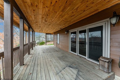 Sheathed in an exquisite brick exterior, this luxurious custom on Lakeview Golf Resort and Spa - Lakeview in West Virginia - for sale on GolfHomes.com, golf home, golf lot