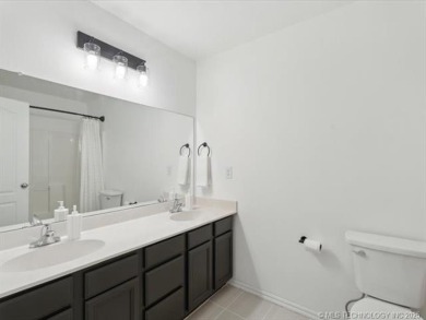 Discover your perfect home in this charming residence in on Bailey Ranch Golf Club in Oklahoma - for sale on GolfHomes.com, golf home, golf lot