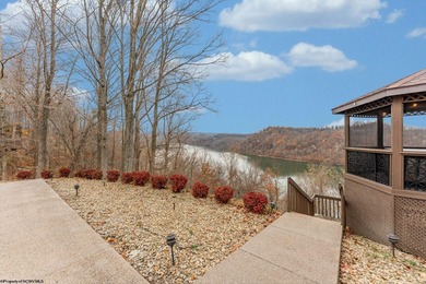 Sheathed in an exquisite brick exterior, this luxurious custom on Lakeview Golf Resort and Spa - Lakeview in West Virginia - for sale on GolfHomes.com, golf home, golf lot