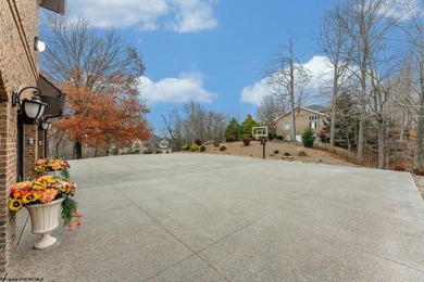 Sheathed in an exquisite brick exterior, this luxurious custom on Lakeview Golf Resort and Spa - Lakeview in West Virginia - for sale on GolfHomes.com, golf home, golf lot