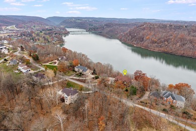Sheathed in an exquisite brick exterior, this luxurious custom on Lakeview Golf Resort and Spa - Lakeview in West Virginia - for sale on GolfHomes.com, golf home, golf lot