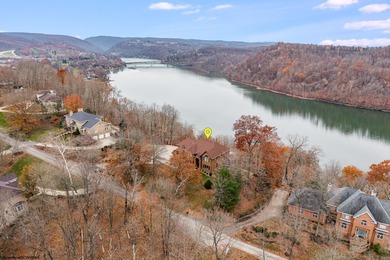 Sheathed in an exquisite brick exterior, this luxurious custom on Lakeview Golf Resort and Spa - Lakeview in West Virginia - for sale on GolfHomes.com, golf home, golf lot
