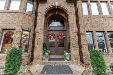 Sheathed in an exquisite brick exterior, this luxurious custom on Lakeview Golf Resort and Spa - Lakeview in West Virginia - for sale on GolfHomes.com, golf home, golf lot